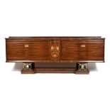 AN ELEGANT FRENCH ART DECO EXOTIC WOODS MARQUETRY INLAID MACASSAR EBONY AND GILT IRON CREDENZA,