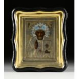 A RUSSIAN FAUX JEWELED AND CLOISONNE ENAMELED SILVER OKLAD MOUNTED ICON OF ST. NICHOLAS, LATE 19TH