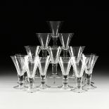 A SET OF FOURTEEN CLEAR SHERRY GLASSES, MODERN, hand blown clear funnel shaped glasses on a bell