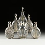 AN ASSEMBLED GROUP OF SIX CHINESE, JAPANESE AND MEXICAN SILVER OVERLAY LIQUOR DECANTERS, MID 20TH