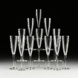 A SET OF TWELVE BACCARAT "DOM PERIGNON" CRYSTAL CHAMPAGNE FLUTES, LATE 20TH CENTURY, clear blown
