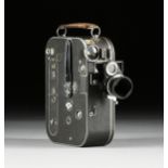 A GERMAN ZEISS IKON MOVIKON 16MM MOVIE CAMERA, CIRCA 1935, with Zeiss lens, aperture chart in