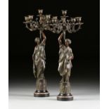 A PAIR OF NEOCLASSICAL REVIVAL FEMALE FIGURAL SIX LIGHT PATINATED SPELTER CANDELABRA, FRENCH, LATE
