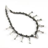A VINTAGE MEXICAN BARRO NEGRO BEAD SILVER SQUASH BLOSSOM NECKLACE, MID/LATE 20TH CENTURY, hand