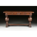 A JACOBEAN STYLE CARVED OAK LIBRARY TABLE, EARLY 20TH CENTURY, with a rectangular framed two panel