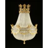 A STUNNING REGENCY STYLE GILT BRONZE AND CRYSTAL BEADED CHANDELIER, EARLY 20TH CENTURY, with a