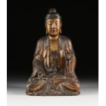 AN ANTIQUE CHINESE PARCEL GILT AND CARVED WOOD FIGURE OF A SEATED BUDDHA, POSSIBLY MING DYNASTY (