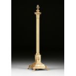 AN EDWARDIAN NEOCLASSICAL REVIVAL BRASS COLUMNAR FLOOR LAMP, EARLY 20TH CENTURY, with a lappet panel