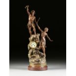 AN ART NOUVEAU GILT METAL AND ROUGE GRIOTTE FIGURAL MARBLE CLOCK, PERSEUS AND ANDROMEDA, A.D.