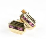 A PAIR OF ART DECO 18KT YELLOW GOLD AND RUBY CUFFLINKS, EARLY/MID 20TH CENTURY, of cascading stepped