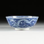 A CHINESE BLUE AND WHITE DRAGON AND CLOUD FOOTED BOWL, KANGXI MARK, QING DYNASTY (1644-1912), the
