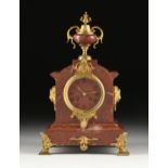 A FRENCH NEOCLASSICAL REVIVAL ORMOLU MOUNTED ROUGE GRIOTTE MARBLE CLOCK, LATE 19TH CENTURY, the