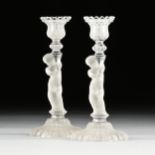 A PAIR OF BACCARAT FROSTED CRYSTAL FIGURAL CANDLESTICKS, SIGNED, EARLY 20TH CENTURY, each modeled as