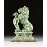 A VICTORIAN GREEN PAINTED CAST IRON ARMORIAL LION ANDIRON, LATE 19TH/EARLY 20TH CENTURY, the lion