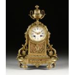 A LOUIS XVI STYLE GILT BRASS CLOCK, JAPY FRERES, CLOCKWORKS, J.E. CALDWELL, RETAILER, PHILADELPHIA