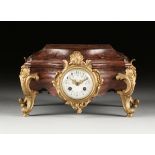 A ROCOCO REVIVAL GILT LACQUERED BRONZE MOUNTED ROUGE GRIOTTE MARBLE MANTLE CLOCK, FRENCH, 1890s, the