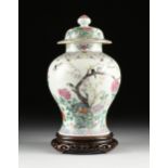 A QING DYNASTY FAMILLE ROSE MAGPIE AND BLOSSOM LIDDED GINGER JAR, QIANLONG MARK, 1644-1912,
