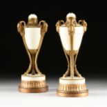 A PAIR OF LOUIS XVI STYLE GILT BRONZE MOUNTED WHITE MARBLE URNS, CIRCA 1900, the cabochon white