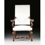 AN ITALIAN BAROQUE STYLE CARVED WALNUT THRONE ARMCHAIR, CIRCA 1850, with a tall rectangular padded