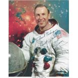 A PAIR OF NASA ASTRONAUT SIGNED PORTRAIT PRINTS, "James A. Lovell in his Spacesuit," CIRCA 1962,