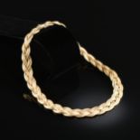 AN 18K YELLOW GOLD GUCCI NECKLACE, the double rope braided design with hidden push-button box