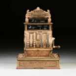 A NATIONAL CASH REGISTER CO. POLISHED RED BRASS REGISTER, MODEL 440, EMPIRE PATTERN, 1909, with