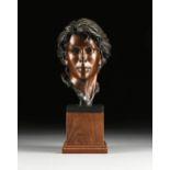 GEORGE W. LUNDEEN (American b. 1948) A SCULPTURE, "Bust of a Young Woman," 1988, patinated bronze,