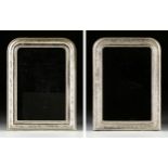 A MATCHED PAIR OF ANTIQUE FRENCH SILVER LEAFED MANTLE MIRRORS, 19TH CENTURY, each with a rounded