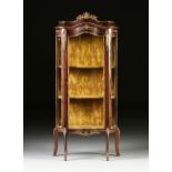 A LOUIS XV STYLE GILT BRONZE MOUNTED MAHOGANY BOMBÉ VITRINE, LATE 19TH/EARLY 20TH CENTURY, with