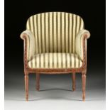 AN ELEGANT LOUIS XVI REVIVAL UPHOLSTERED AND CARVED WALNUT BERGÉRE EN GONDOLE, EARLY 20TH