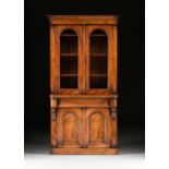 AN AMERICAN CLASSICAL WALNUT, ROSEWOOD AND MAHOGANY BOOKCASE CABINET, 1840s, the cavetto crown