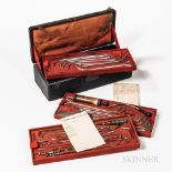 Early French Urological Traveling Set, c. 1860s, tooled leather case with bail handle plate engraved