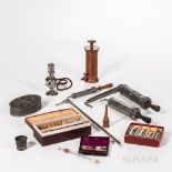 Collection of 19th and 20th Century Medical Instruments and Devices, a French dry cupping set in ori