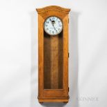 Standard Electric Time Master Clock, birch case with full-length glazed door, wood bezel surrounds t