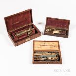 Three Cased 19th Century Enema Sets, England, velvet-lined fitted mahogany cases with brass and pewt