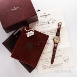 Patek Philippe 18kt Gold Reference 5035 Wristwatch with Boxes and Papers, annual calendar silvered d