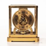 Jaeger-LeCoultre Co. Atmos Clock, no. 12077, 5-in. gilt dial with applied black arabic numerals and