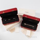 Two Limited Edition Cartier Ballpoint Watch Pens, number 1470/2000 and number 0627/2000 with rotatin