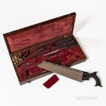 W. Strange Cased Amputation Set, England, c. 1815, figured mahogany case opening to a burgundy fitte