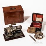 Two Early Scientific Instruments, Bausch & Lomb cherry cased Mikrotome number 2080 on a painted cast