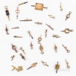 Thirty-one Gilt Watch Keys, 19th/20th century, engraved, chased, and embossed examples.