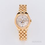 18kt Gold Patek Philippe Annual Calendar Reference 5036/1J Wristwatch, 18kt gold case and bracelet,