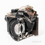 Rare Nikon EM Factory Cut Display Camera, full size camera with clear plastic components on top and