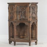 Gothic-style Carved Oak Cabinet, late 19th/early 20th century, with an upper cabinet door with a cen