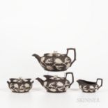 Four Wedgwood Dark Brown Stoneware Prunus Tea Wares, England, early 19th century, each oval shape an
