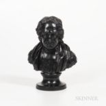 Wedgwood & Bentley Black Basalt Bust of Dean Swift, England, c. 1775, mounted atop a waisted circula