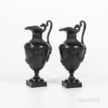 Pair of Neale Black Basalt Ewers, England, late 18th century, each with heart-shaped spout and scrol