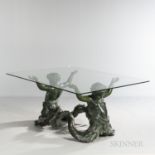 Bronze Putti de Mare and Glass Table, Italy, c. 1960, the figural base depicting a pair of aquatic f