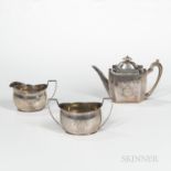 Assembled Three-piece Sterling Silver Tea Service, each with an engraved, matching armorial, teapot