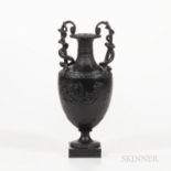 Wedgwood Black Basalt Snake-handled Vase, England, late 18th century, depictions in relief of Venus